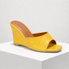 Women's yellow heels close-up — elegant — Christina Wedge Sandals — Oscar Blackwood