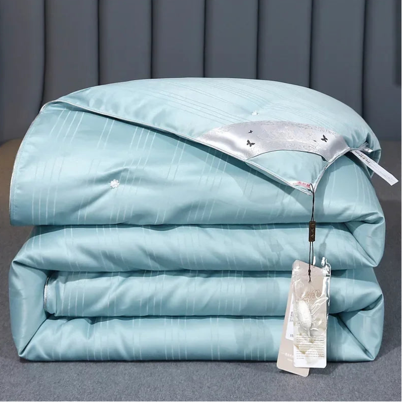 Unisex teal cotton moonlight detail view — versatile — Moonlight Mulberry Silk Comforter — Oscar Blackwood