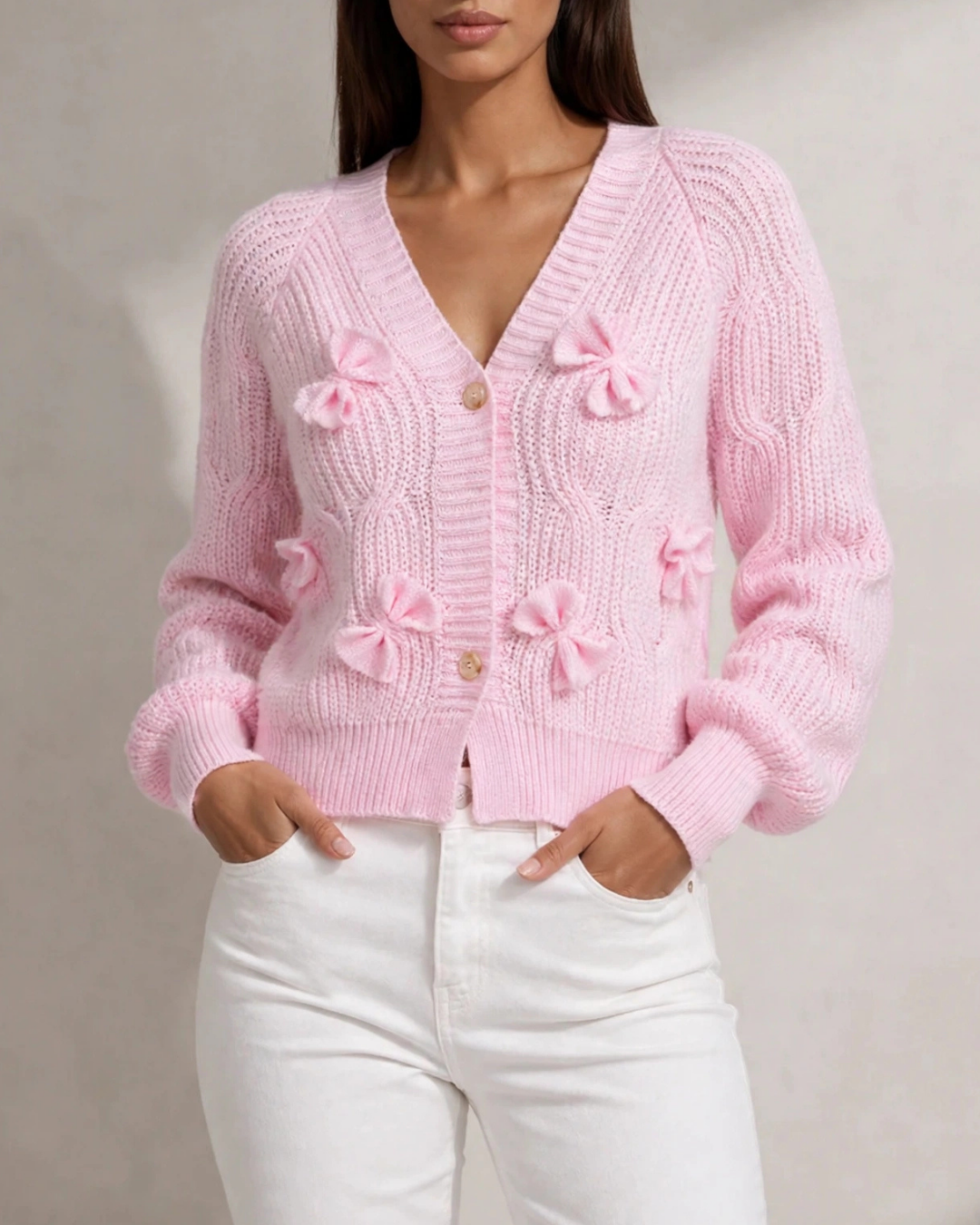 Women's pink ribbed cardigan side view — cozy — Romina Bow Knit Cardigan — Oscar Blackwood