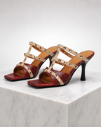 Women's red heels side view — elegant — Giulia Studded Heeled Mules — Oscar Blackwood