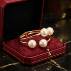 Women's gold lace jewelry front view — versatile — Aura Double Pearl Bangle — Oscar Blackwood