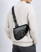Women's leather handbag side view — everyday — Albert Saddle Crossbody Bag — Oscar Blackwood