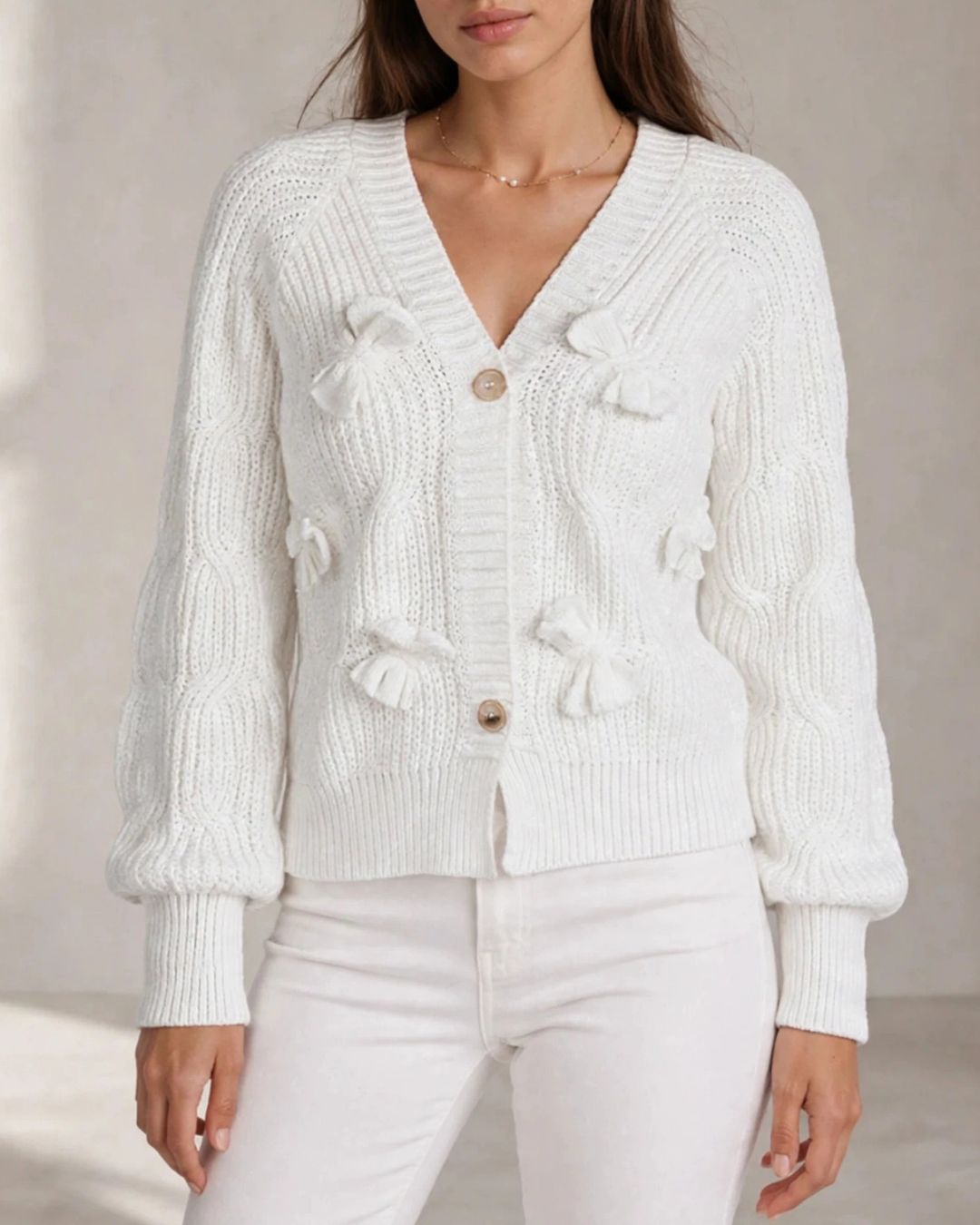 Women's white ribbed cardigan back view — cozy — Romina Bow Knit Cardigan — Oscar Blackwood