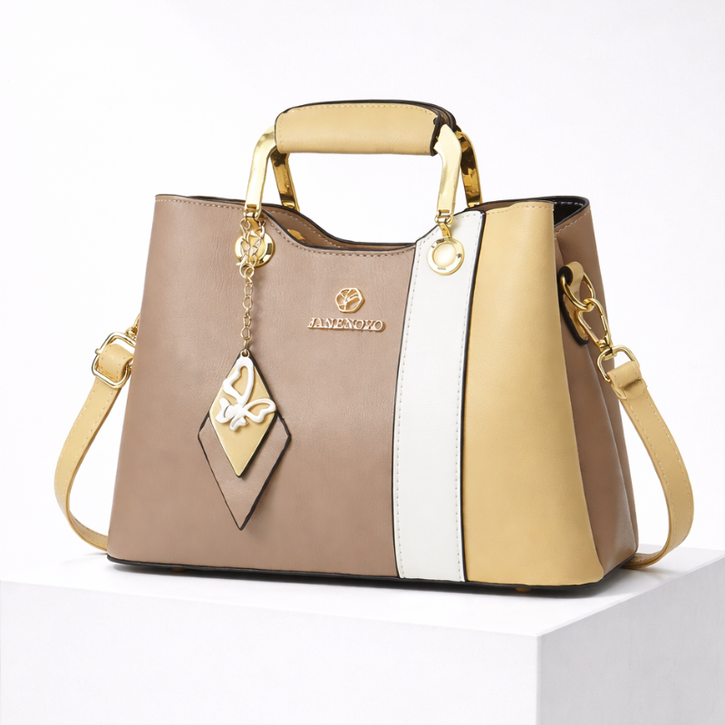 Women's beige leather handbag styled look — everyday — Janenovo Butterfly Handbag — Oscar Blackwood