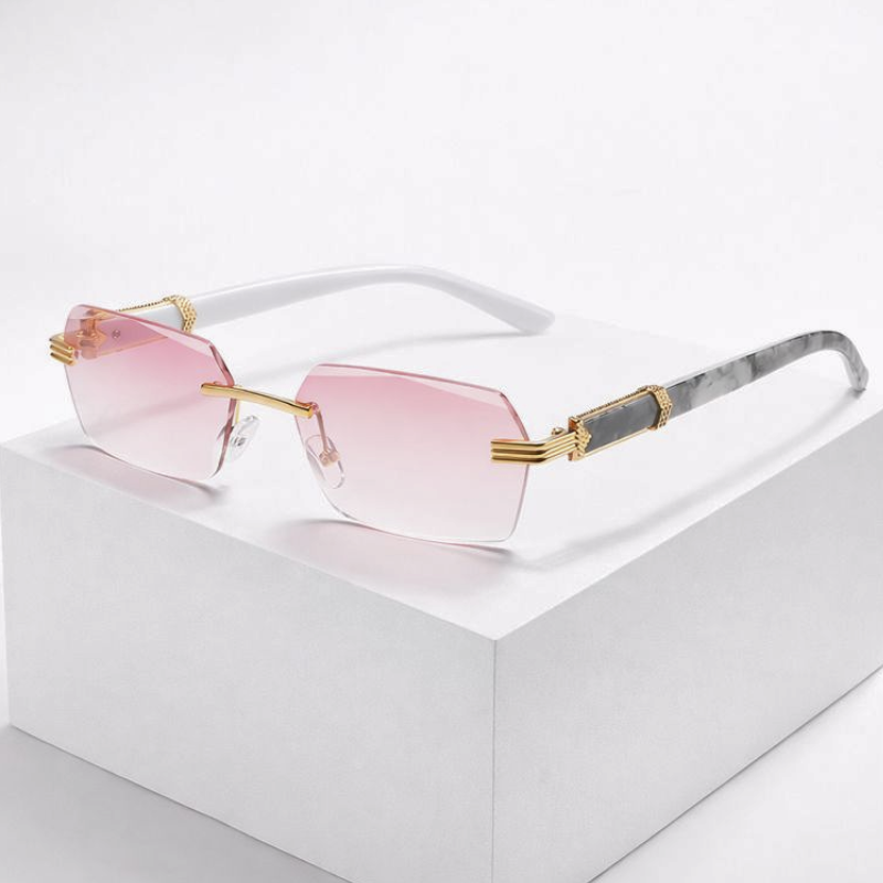 Women's pink sunglasses close-up — statement — Cassie Rimless Shades — Oscar Blackwood