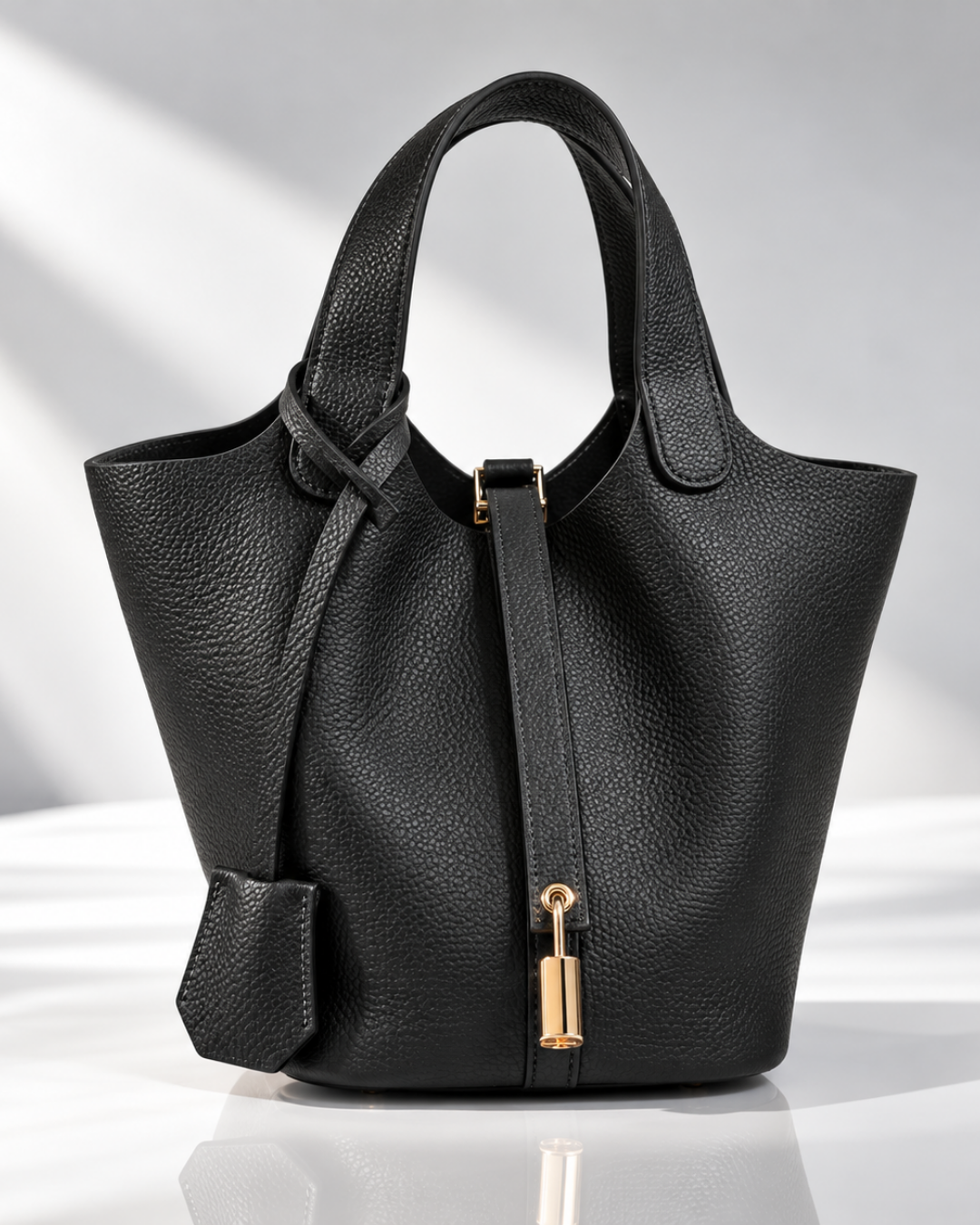 Women's black leather bag side view — everyday — Mara Leather Bucket Bag — Oscar Blackwood
