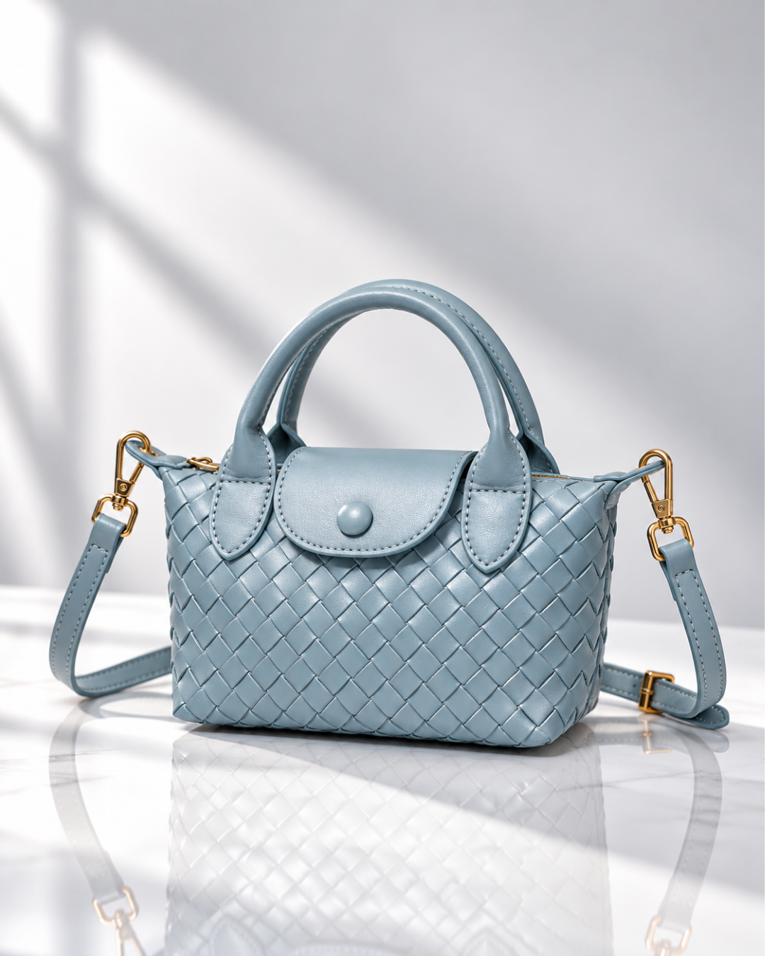 Women's light blue woven handbag back view — everyday — Marguerite Woven Crossbody Handbag — Oscar Blackwood