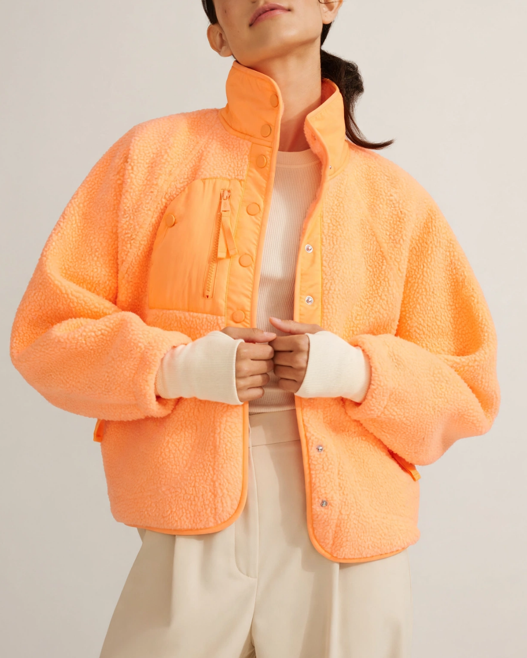 Women's orange textured jacket close-up — outerwear — Embla Fleece Jacket — Oscar Blackwood