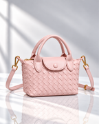 Women's pink woven handbag close-up — everyday — Marguerite Woven Crossbody Handbag — Oscar Blackwood