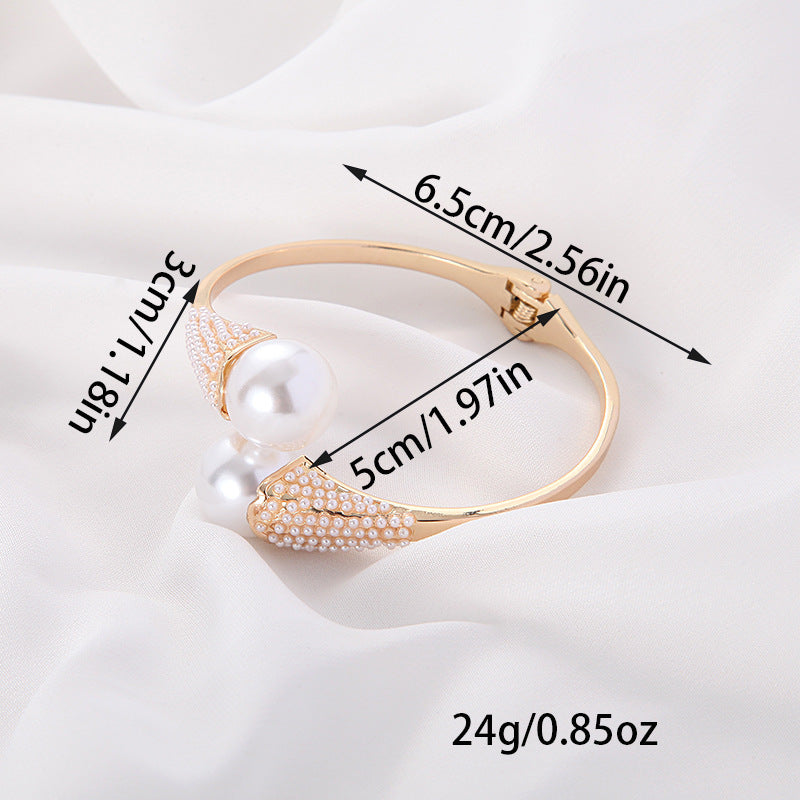Women's jewelry back view — versatile — Aura Pearl Bangle for every occasion — Oscar Blackwood