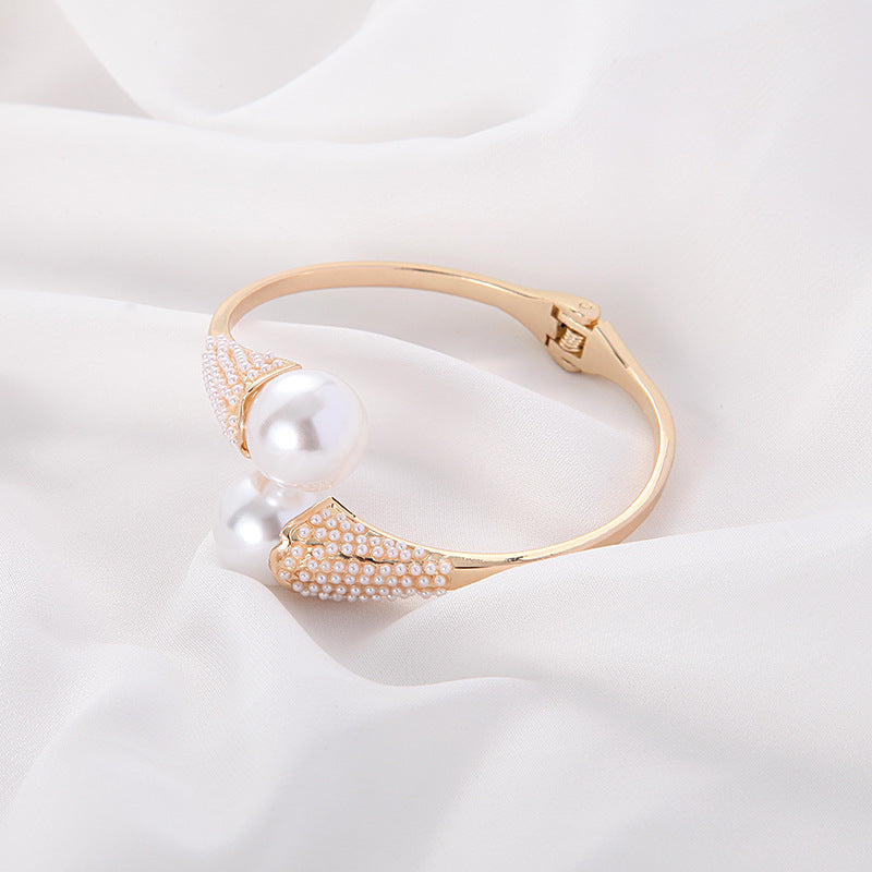 Women's jewelry close-up — versatile — Aura Pearl Bangle for every occasion — Oscar Blackwood