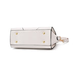 Women's leather handbag side view — everyday — Miaura Cat-Ear Handbag — Oscar Blackwood