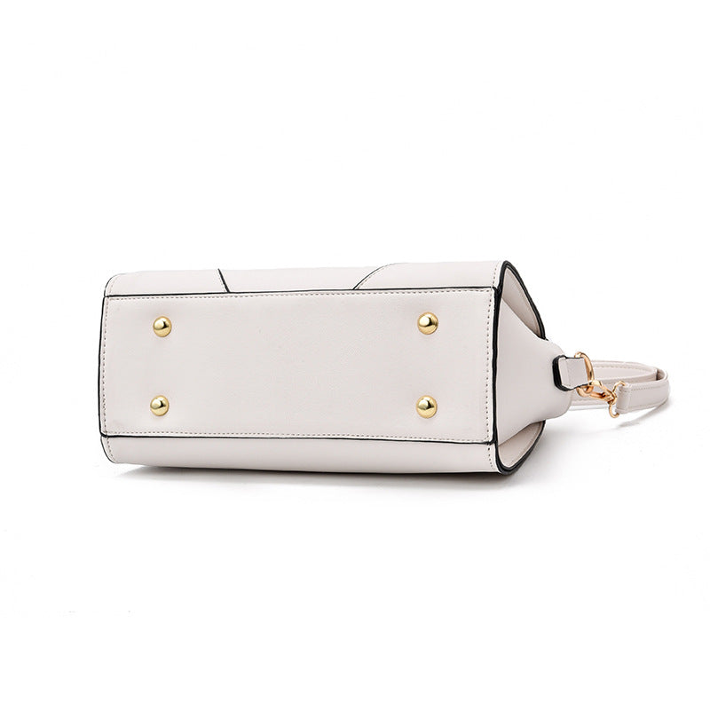 Women's leather handbag side view — everyday — Miaura Cat-Ear Handbag — Oscar Blackwood