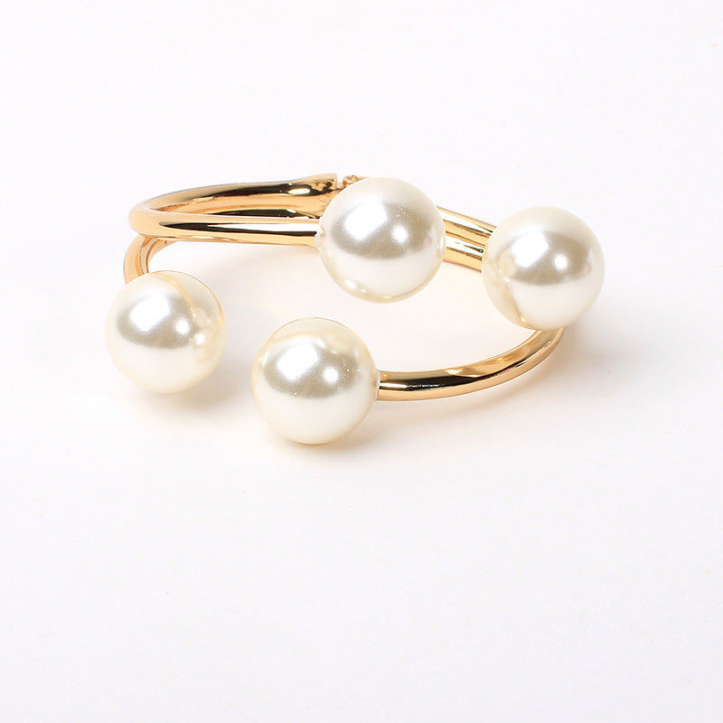Women's gold lace jewelry detail view — versatile — Aura Double Pearl Bangle — Oscar Blackwood