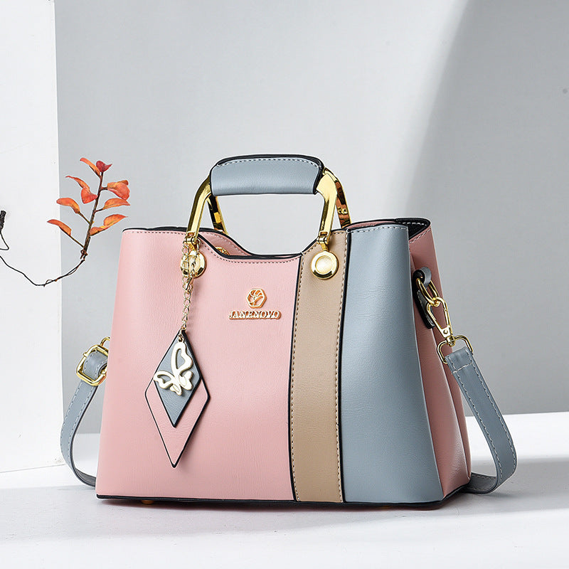 Women's leather handbag close-up — everyday — Janenovo Butterfly Handbag — Oscar Blackwood