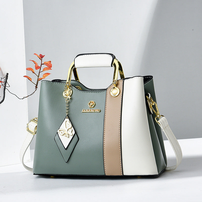 Women's leather handbag detail view — everyday — Janenovo Butterfly Handbag — Oscar Blackwood