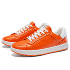 Men's orange leather shoes detail view — versatile — Double-Waggle Golf Shoes — Oscar Blackwood