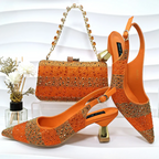 Women's orange heels color detail — elegant — Vittoria Heels & Bag — Oscar Blackwood