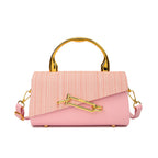 Women's pink geometric handbag close-up — everyday — Samira Crossbody Handbag — Oscar Blackwood